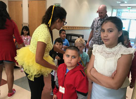  students waiting in line in cafeteria